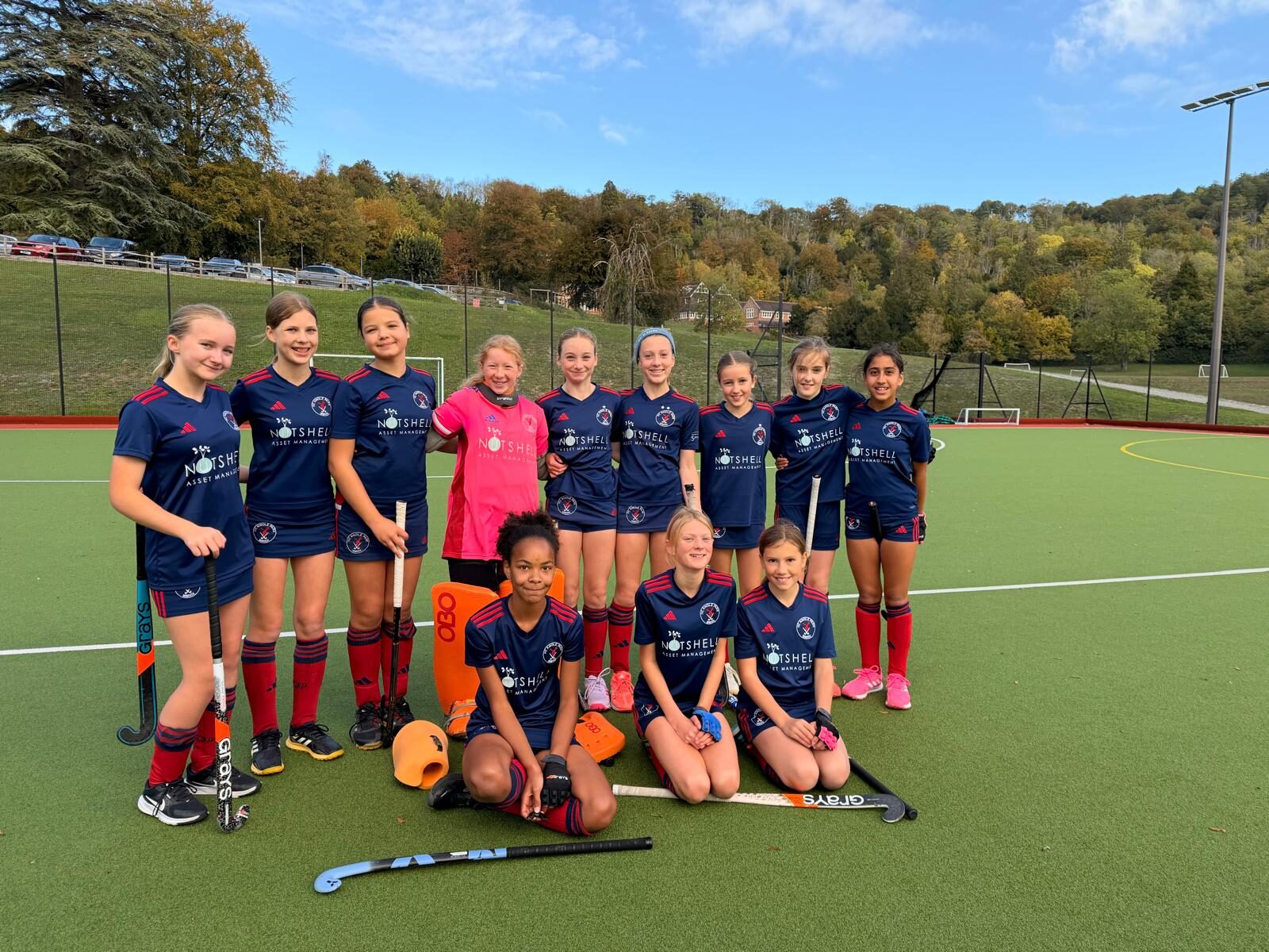 The HC Knole Park GU14 squad together on the pitch after their win over Herne Bay