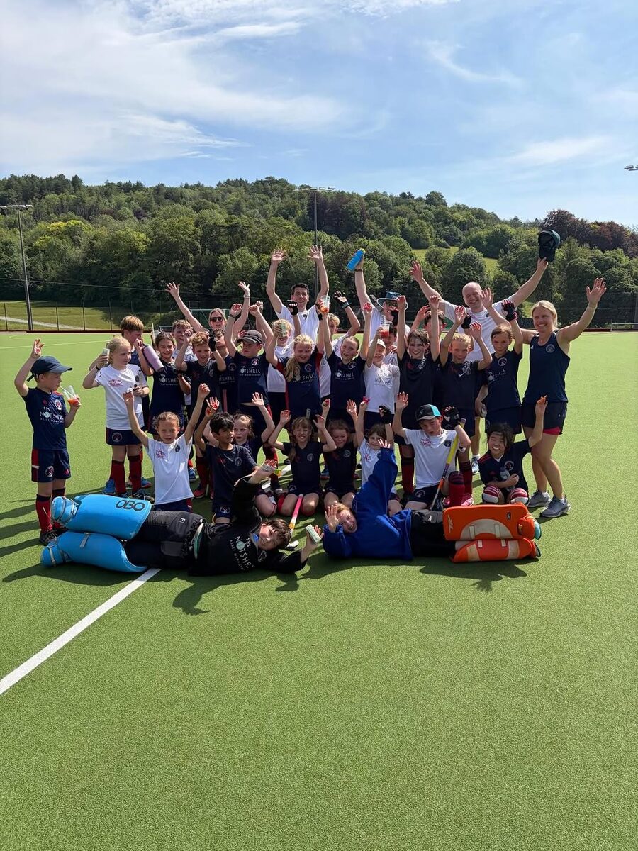 HC Knole Park juniors and coaches celebrating the final training session of the season