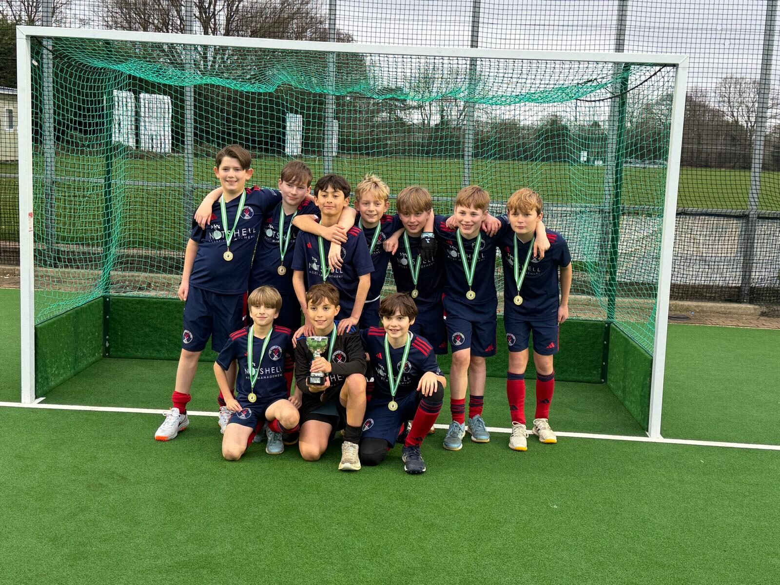 U10 Boys — champions with their medals 🏅