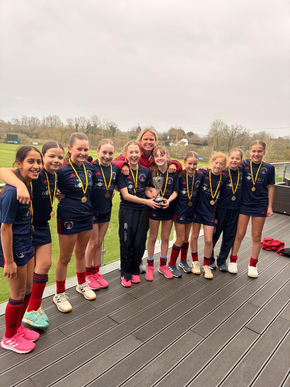 U12 Girls — regional champions, medals in hand 🥇